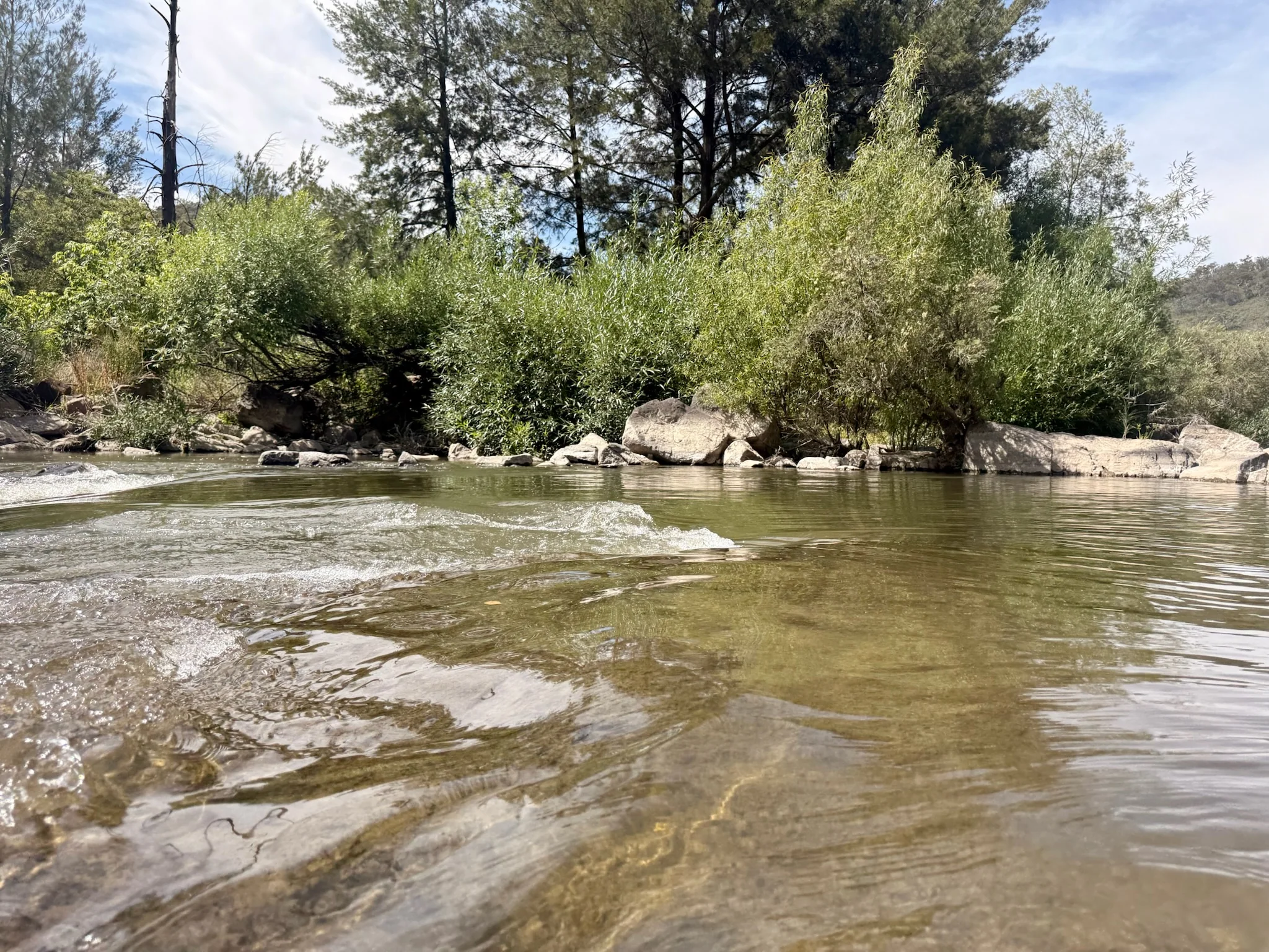 Summer water flowing through the rocky Murrumbidgee River at Murrumbella